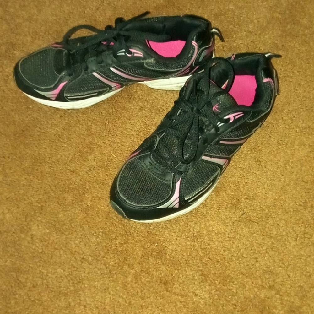Pink black athletic shoe